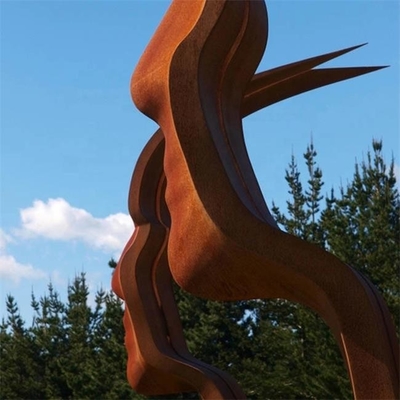 Ligne ruban en acier de Heek de visages de la sculpture deux en Corten imaginaire