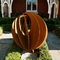 Sculpture de sphère d'art en acier Corten en métal creux 600mm 900mm