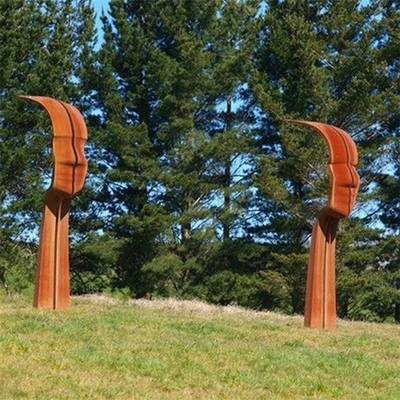 Ligne ruban en acier de Heek de visages de la sculpture deux en Corten imaginaire